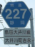 É227